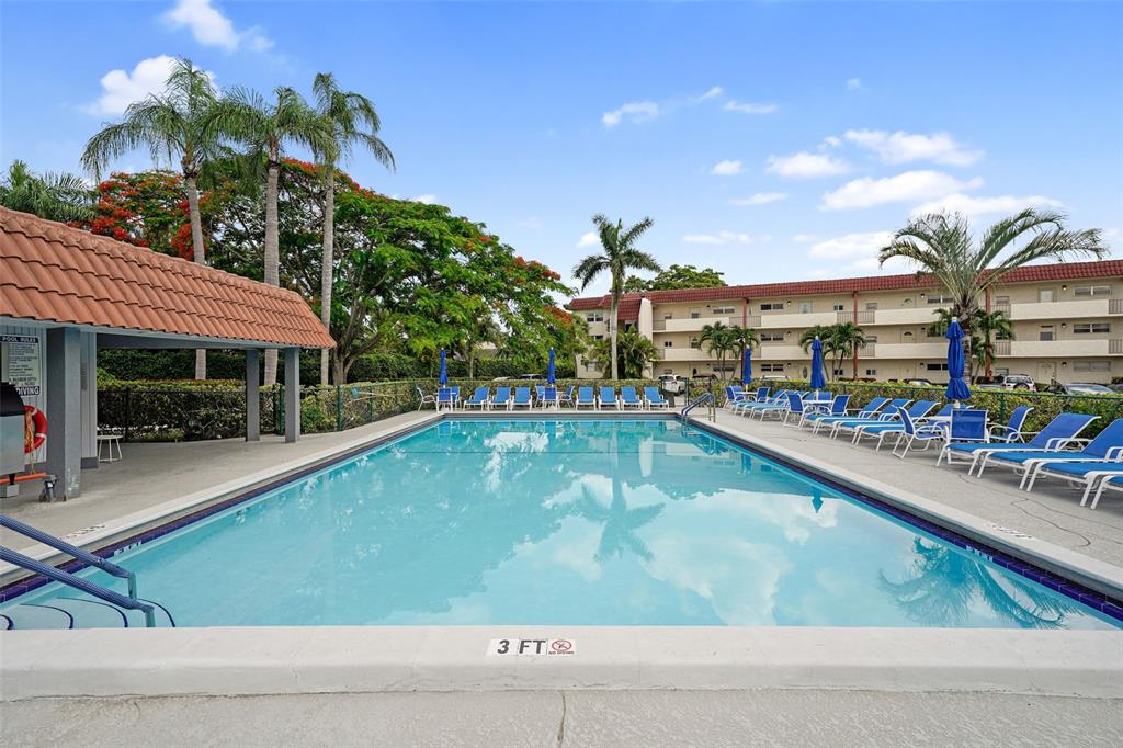 361 South Hollybrook Drive, Unit 201 Pembroke Pines, FL 33025 - Photo 32 of 52 a view of swimming pool