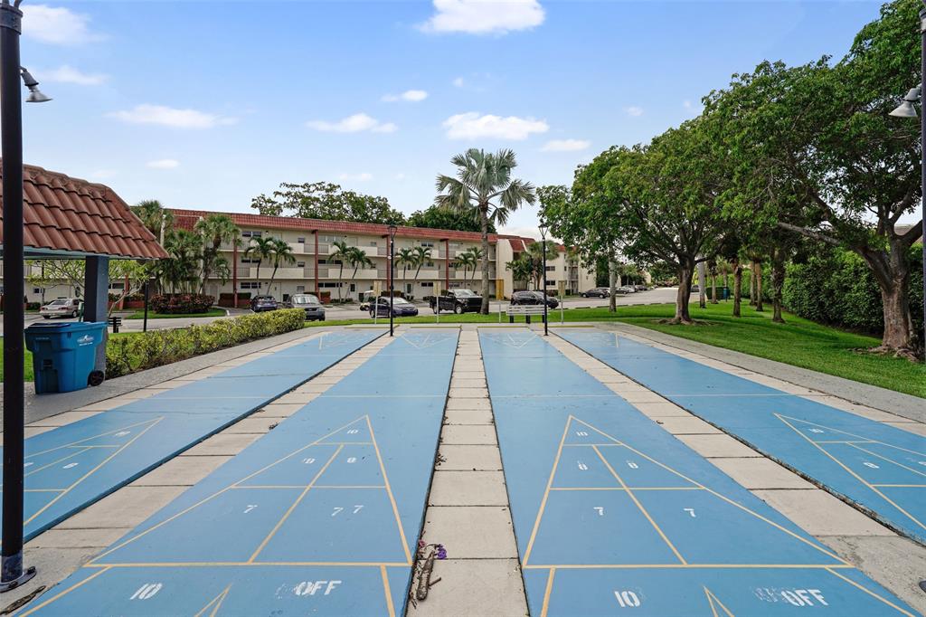 361 South Hollybrook Drive, Unit 201 Pembroke Pines, FL 33025 - Photo 34 of 52 a view of city street with a building in the background