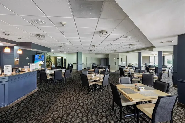 a view of a dining room with furniture