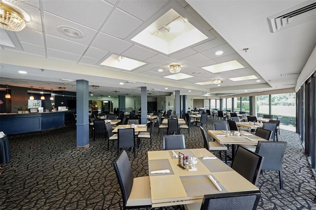 361 South Hollybrook Drive, Unit 201 Pembroke Pines, FL 33025 - Photo 38 of 52 a view of a dining room with furniture
