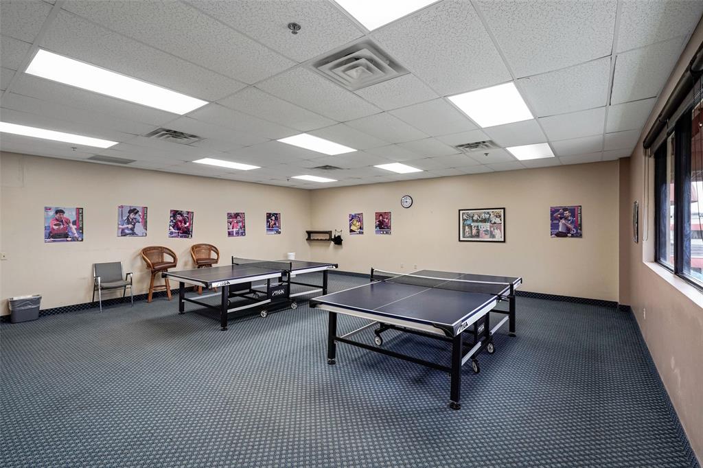 361 South Hollybrook Drive, Unit 201 Pembroke Pines, FL 33025 - Photo 49 of 52 a living room with furniture and a window