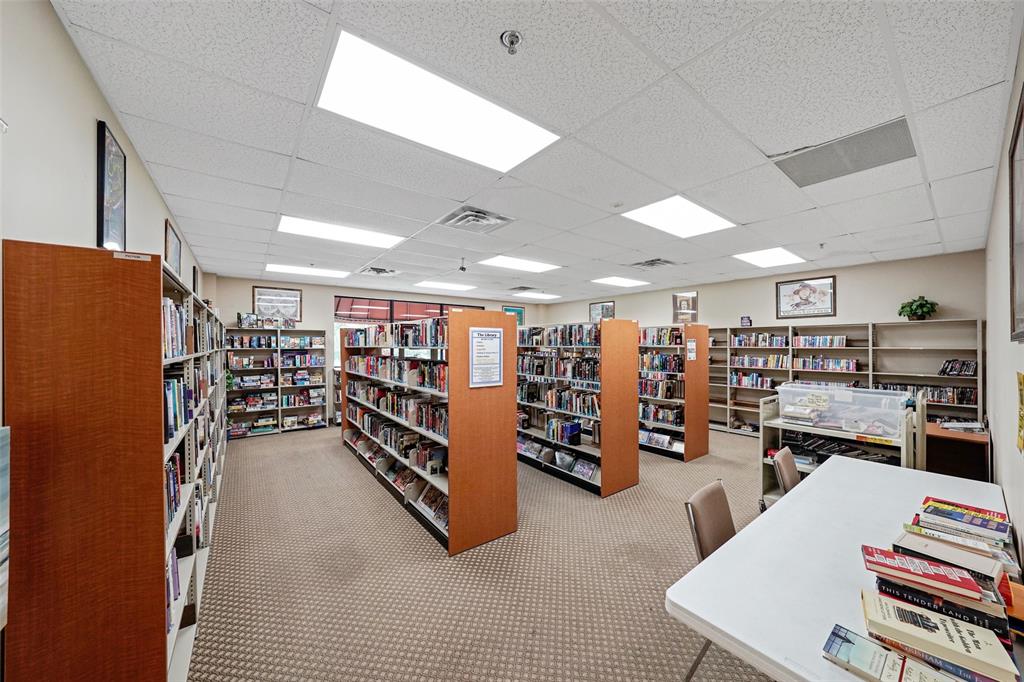 361 South Hollybrook Drive, Unit 201 Pembroke Pines, FL 33025 - Photo 52 of 52 a view of a room with lots of furniture and garage
