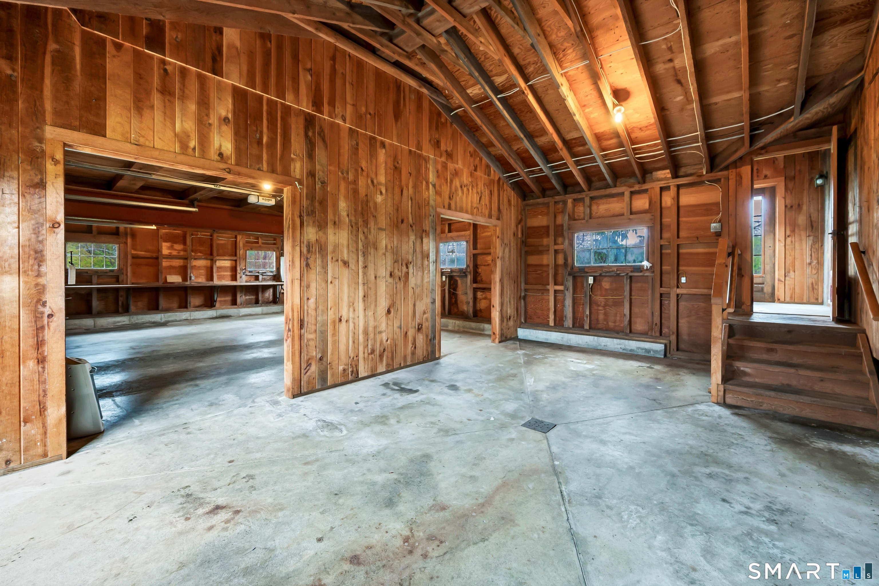 139 West Side Road Goshen, CT 06756 - Photo 13 of 17 a view of a hallway with wooden walls