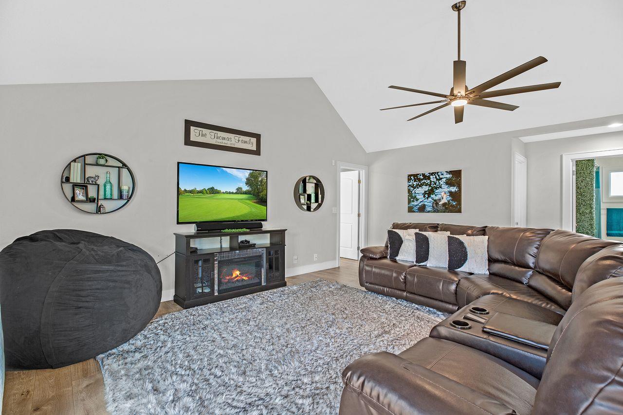 17745 Park Way Morgan Hill, CA 95037 - Photo 12 of 36 a living room with furniture and a flat screen tv