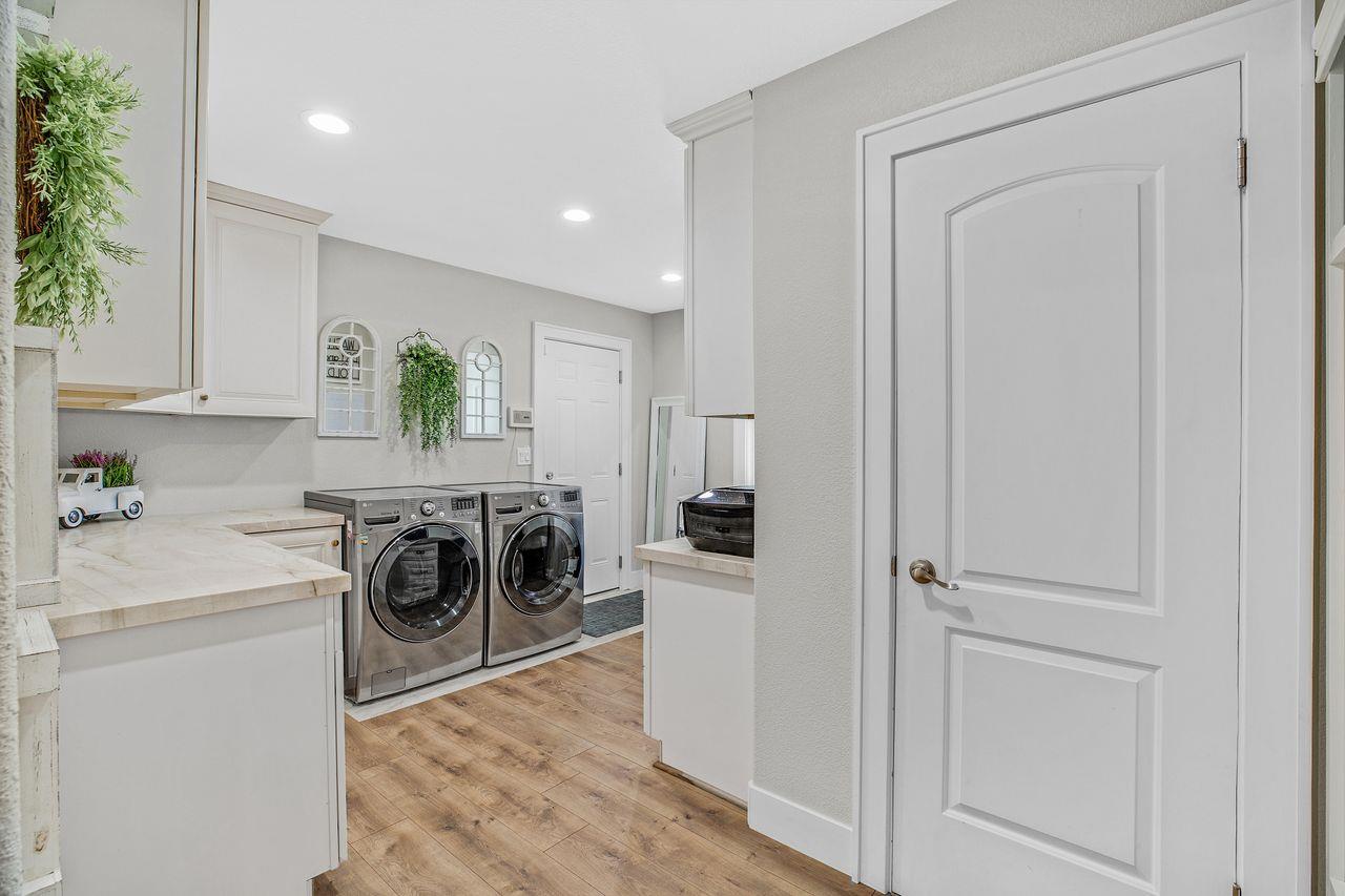 17745 Park Way Morgan Hill, CA 95037 - Photo 22 of 36 a kitchen with a refrigerator a stove and a cabinets