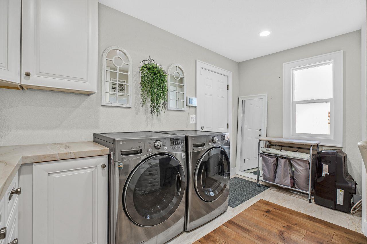 17745 Park Way Morgan Hill, CA 95037 - Photo 23 of 36 a utility room with sink dryer and washer