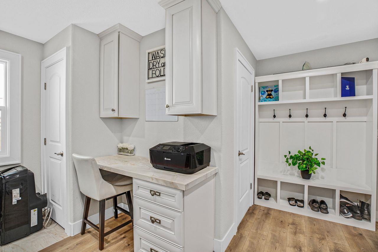 17745 Park Way Morgan Hill, CA 95037 - Photo 24 of 36 a kitchen with stainless steel appliances a stove a refrigerator a white table and chairs