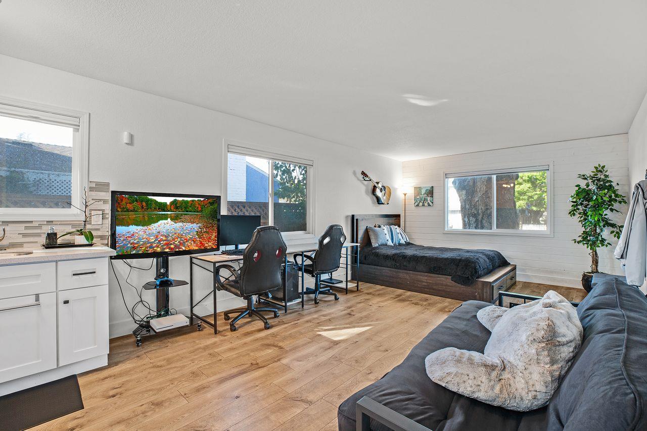 17745 Park Way Morgan Hill, CA 95037 - Photo 27 of 36 a living room with furniture and a flat screen tv
