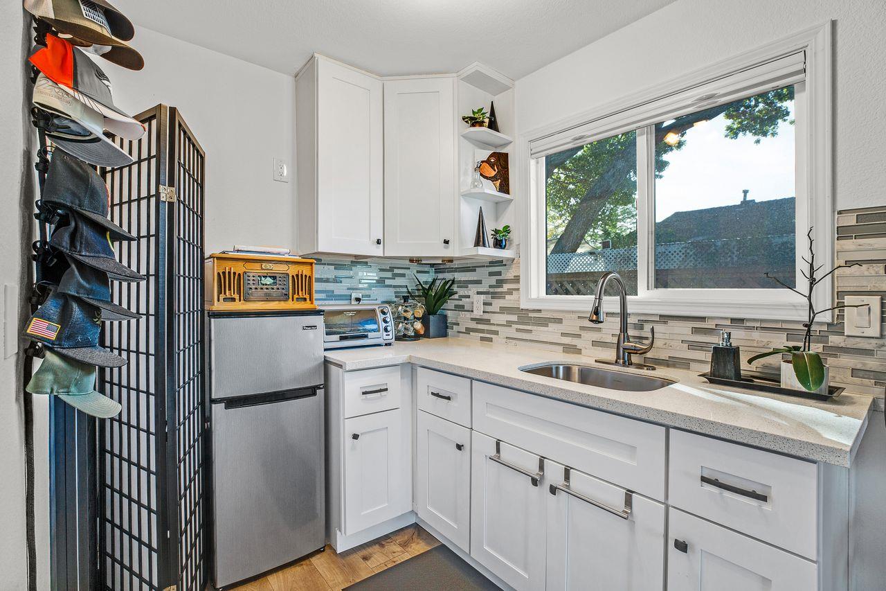 17745 Park Way Morgan Hill, CA 95037 - Photo 29 of 36 a kitchen with a sink cabinets and window