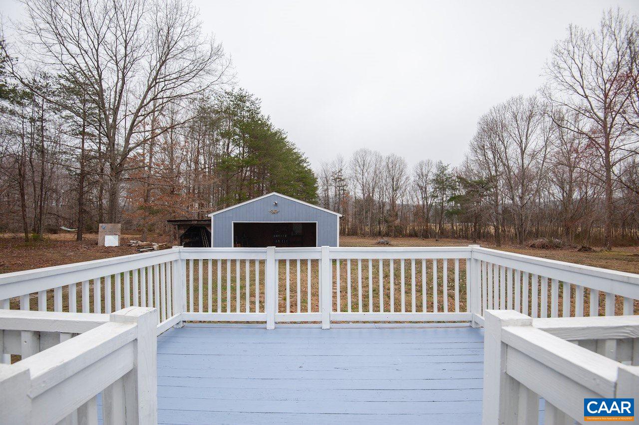 1358 Craigtown Road Shipman, VA 22971 - Photo 5 of 38 a view of a wooden deck and trees