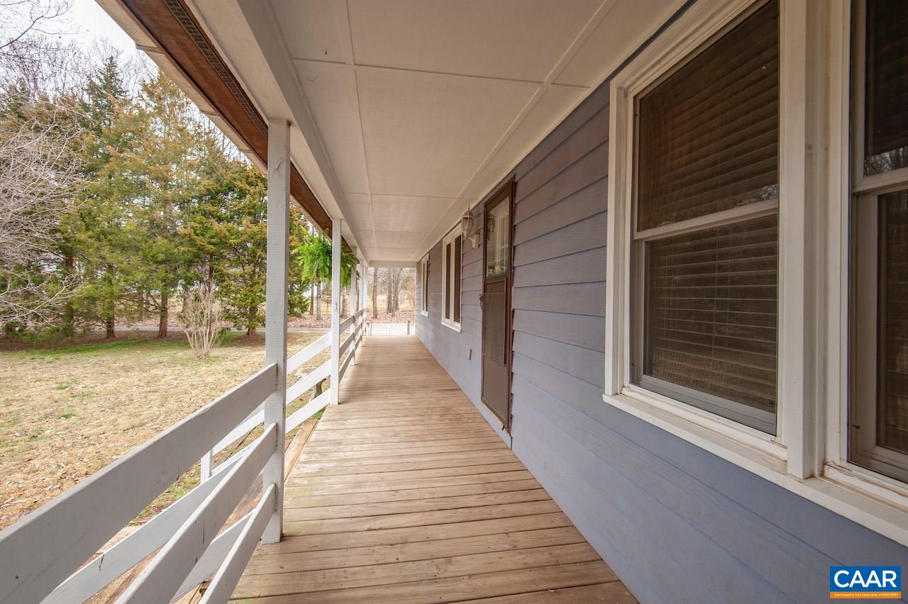 1358 Craigtown Road Shipman, VA 22971 - Photo 8 of 38 a view of a balcony with wooden floor and floor to ceiling windows