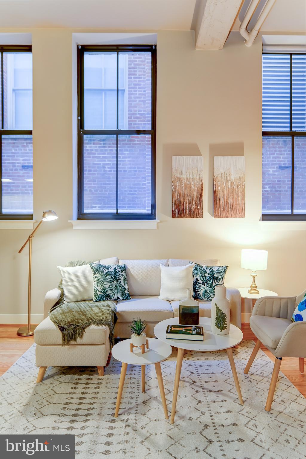 916 G St. Northwest, Unit 306 Washington, DC 20001 - Photo 6 of 25 Soaring ceilings and large windows!