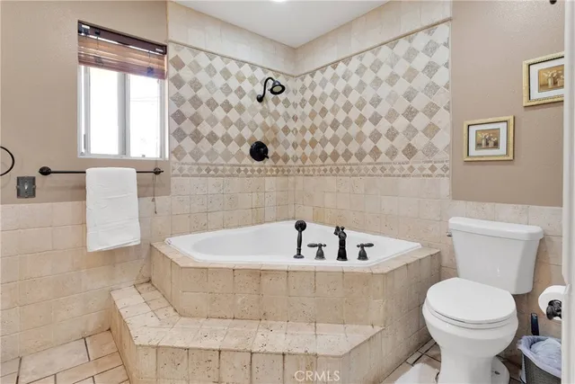 a view of a patio with couches chairs dining table and chairs