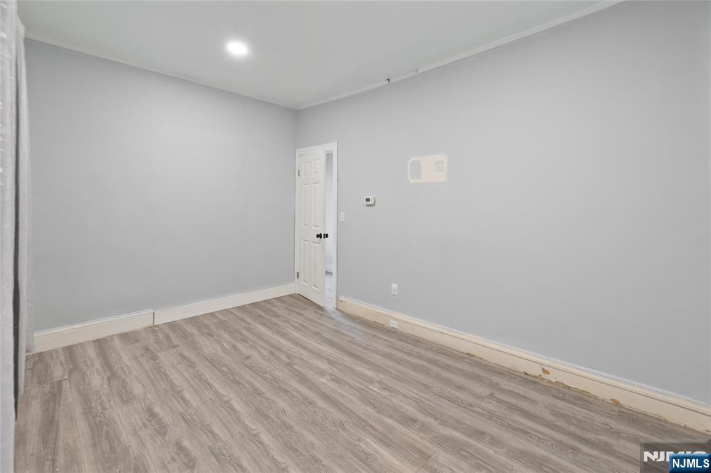 580 Monroe Avenue, Unit 1 Elizabeth, NJ 07201 - Photo 7 of 10 wooden floor in a room