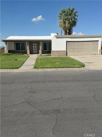 a view of building with yard