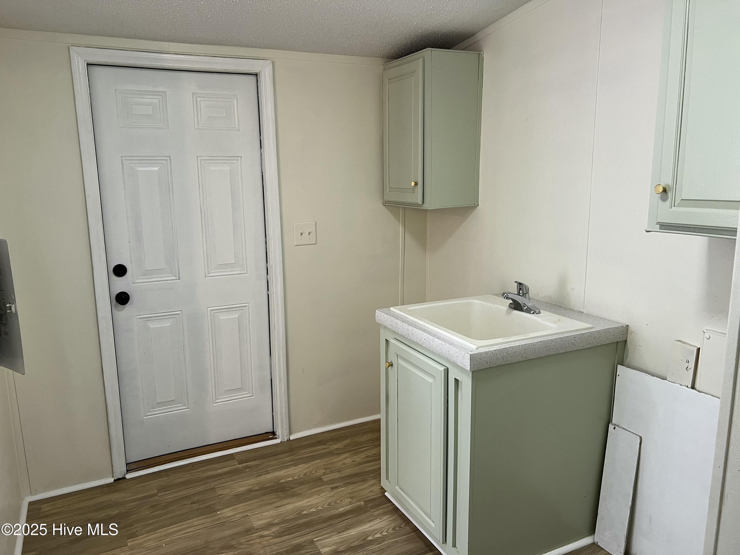 102 Ruger Court Pikeville, NC 27863 - Photo 22 of 44 Laundry room and back door