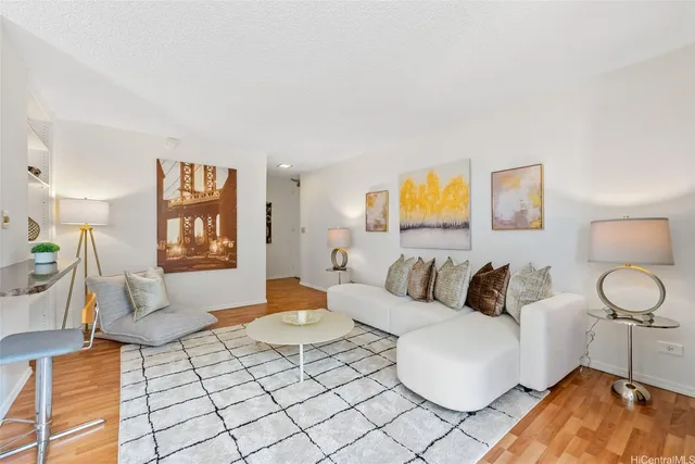 a living room with furniture and a couch