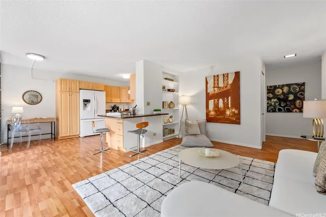 a living room with furniture and a table