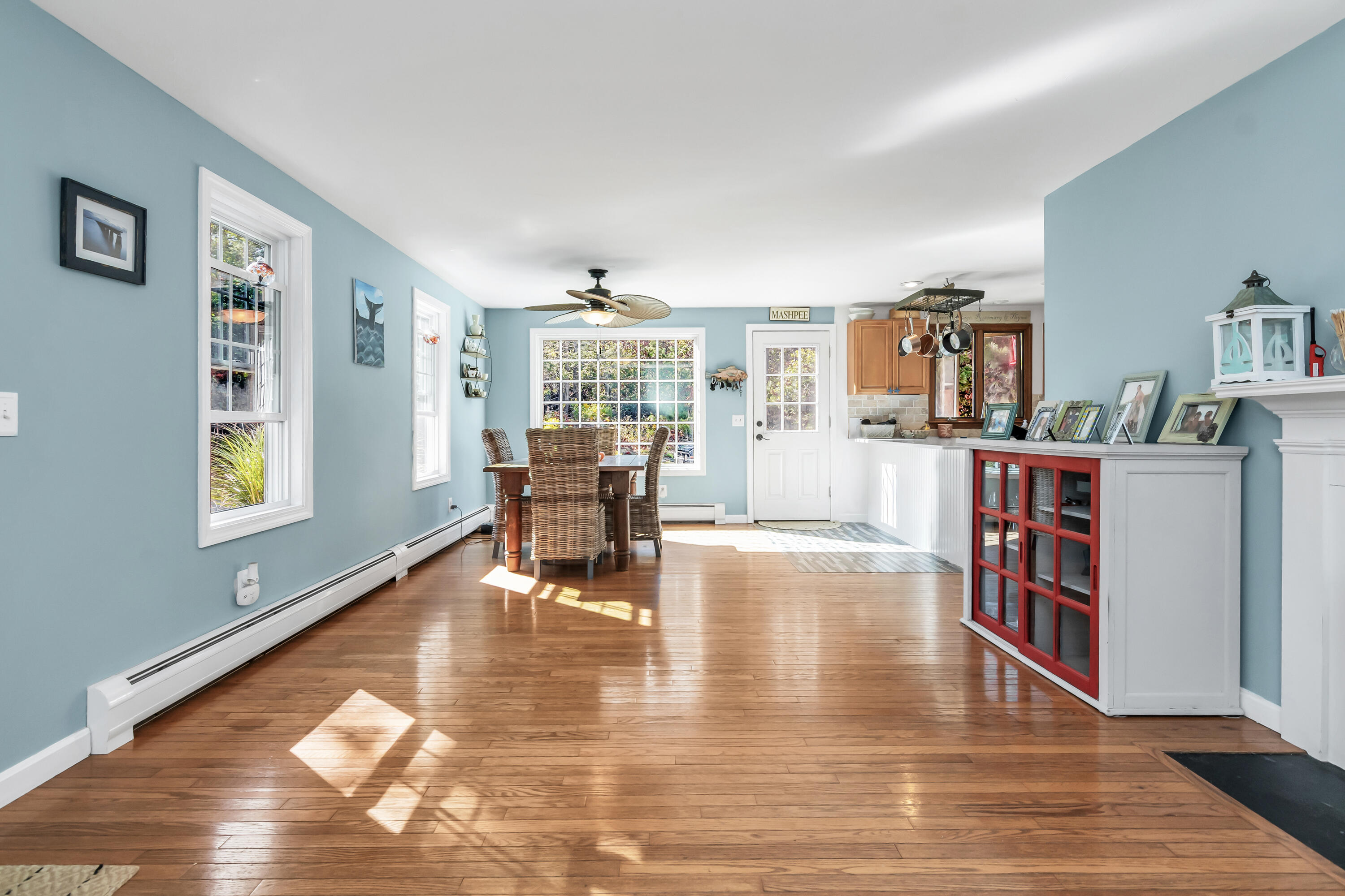 76 Trout Brook Road Mashpee, MA 02649 - Photo 12 of 43 a living room with furniture and a wooden floor