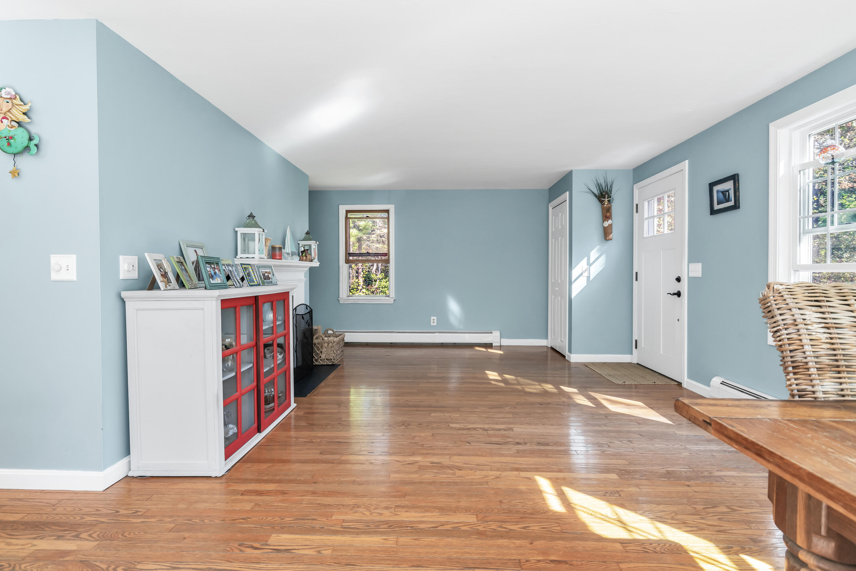 76 Trout Brook Road Mashpee, MA 02649 - Photo 14 of 43 a hall with a cabinet and a window