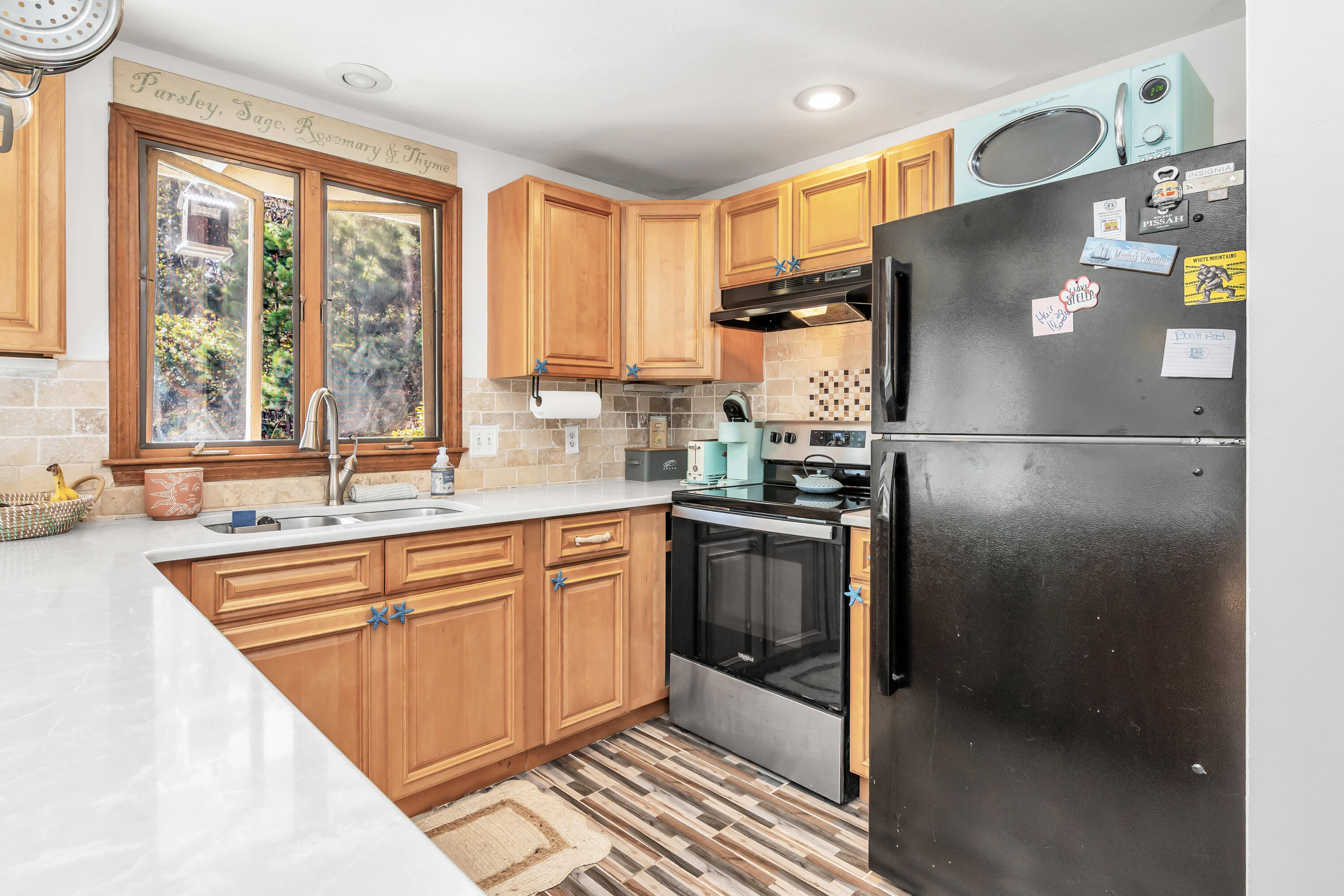 76 Trout Brook Road Mashpee, MA 02649 - Photo 17 of 43 a kitchen with stainless steel appliances granite countertop a refrigerator and a sink