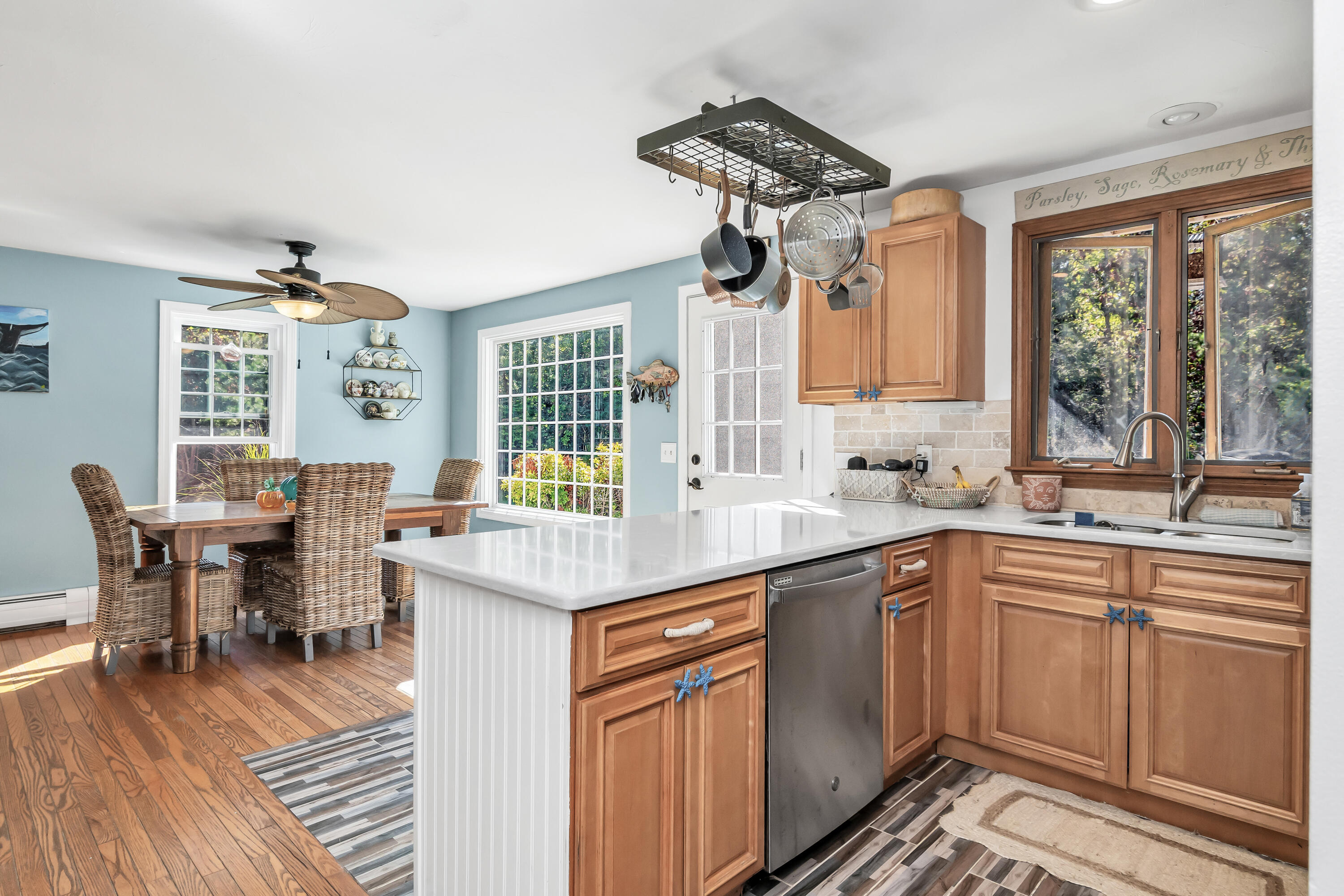 76 Trout Brook Road Mashpee, MA 02649 - Photo 19 of 43 a kitchen with stainless steel appliances granite countertop sink stove top oven and cabinets