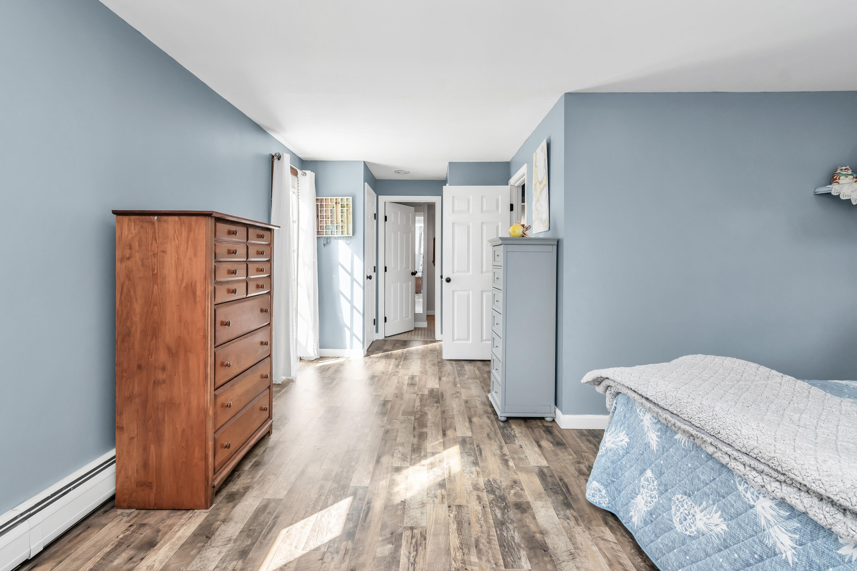 76 Trout Brook Road Mashpee, MA 02649 - Photo 23 of 43 a view of hallway with wooden floor