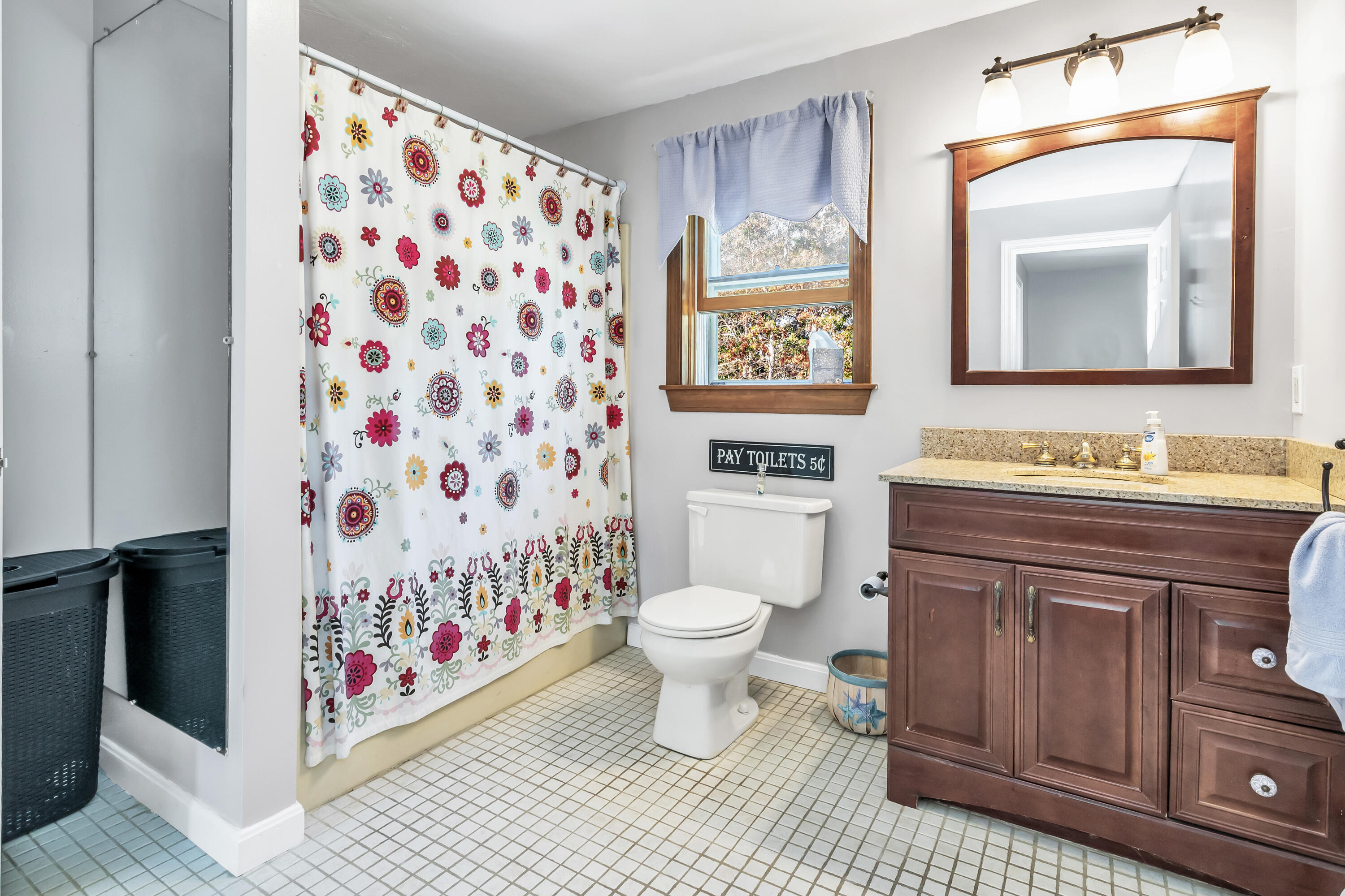 76 Trout Brook Road Mashpee, MA 02649 - Photo 27 of 43 a bathroom with a toilet sink and mirror