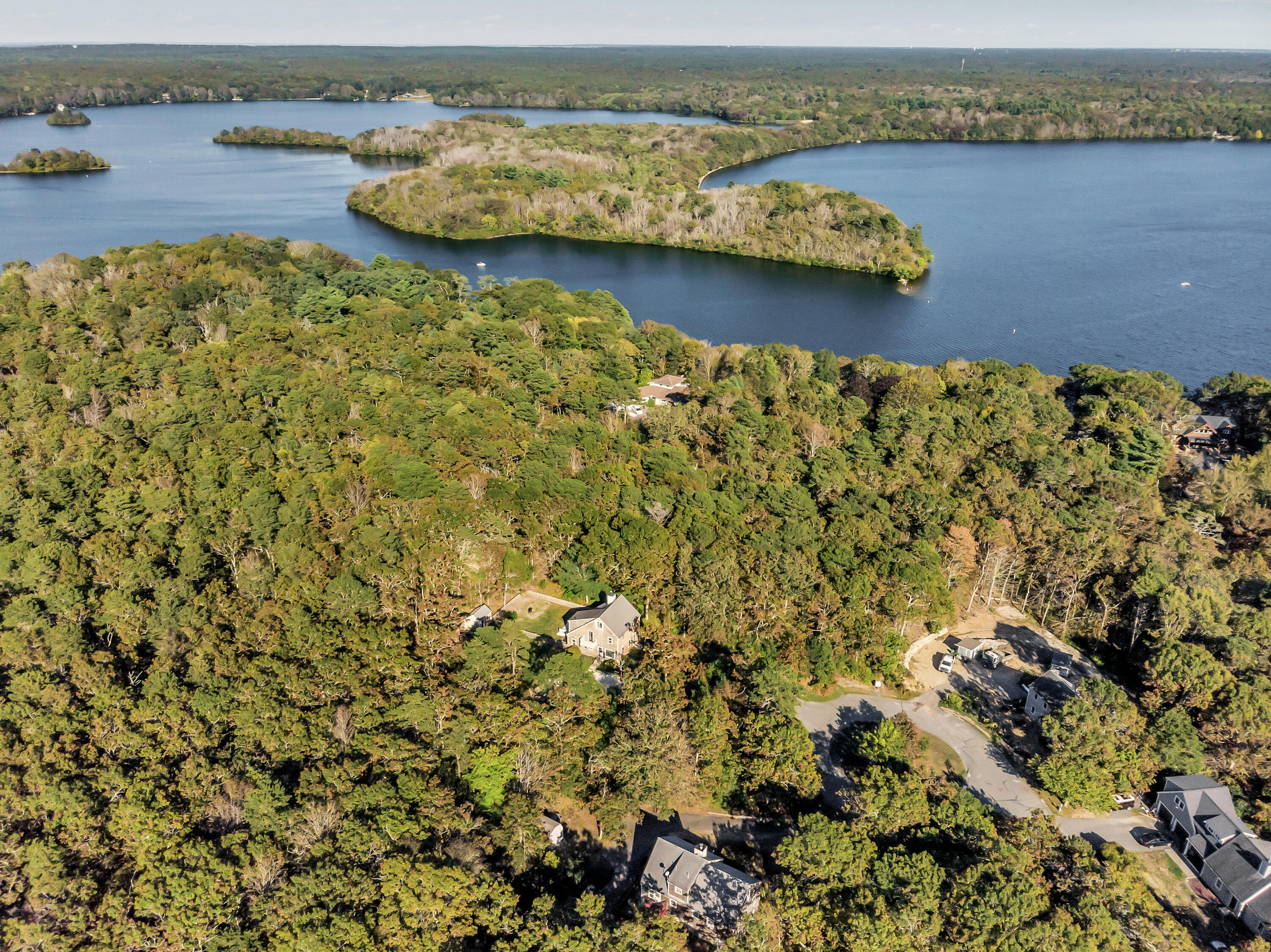 76 Trout Brook Road Mashpee, MA 02649 - Photo 35 of 43 view of a lake with lawn chairs