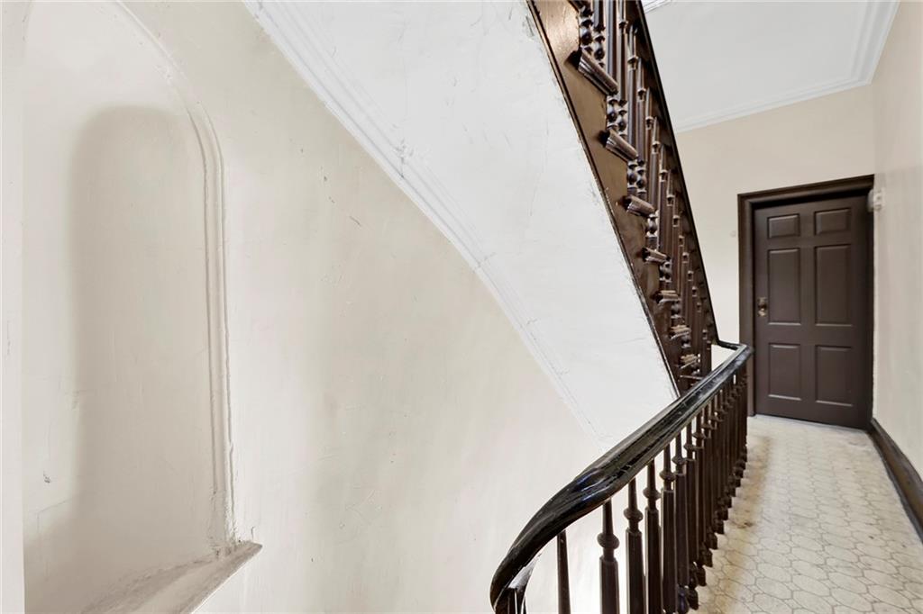 398 Henry Street Brooklyn, NY 11201 - Photo 13 of 14 a view of stairs with stairs