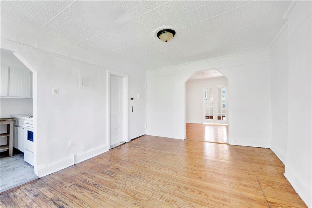 398 Henry Street Brooklyn, NY 11201 - Photo 6 of 14 a view of empty room with wooden floor