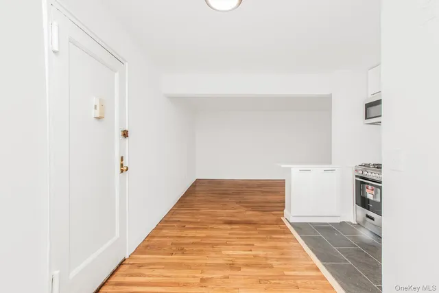 a view of a hallway with workspace