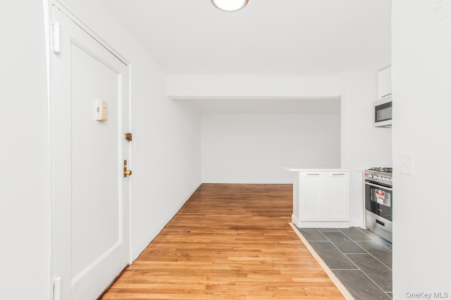 2165 Matthews Avenue, Unit 4B Bronx, NY 10462 - Photo 12 of 16 a view of a hallway with workspace