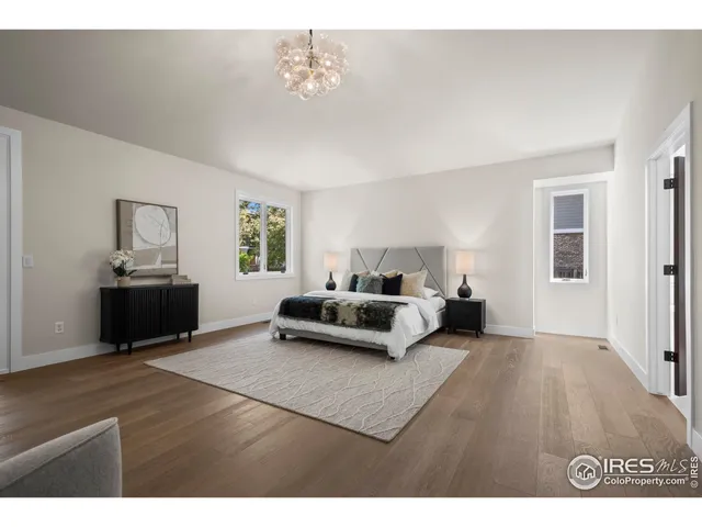 a bathroom with a double vanity sink and mirror
