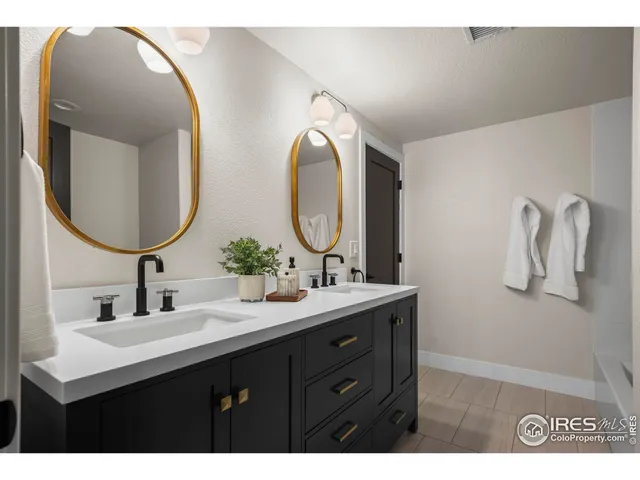 a view of a patio with couches chairs and potted plants