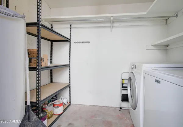 a view of a house with swimming pool and a yard