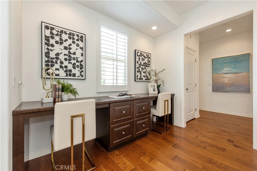 238 Shelbourne Irvine, CA 92620 - Photo 12 of 36 a room with a window and a wooden floor