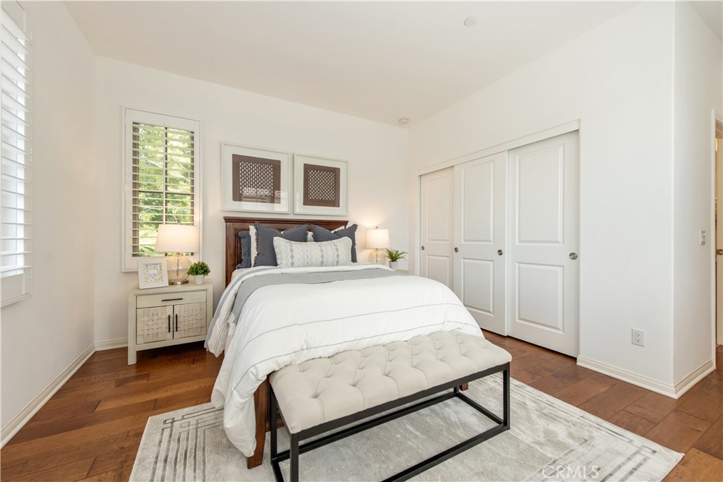 238 Shelbourne Irvine, CA 92620 - Photo 22 of 36 a bedroom with a bed and a window