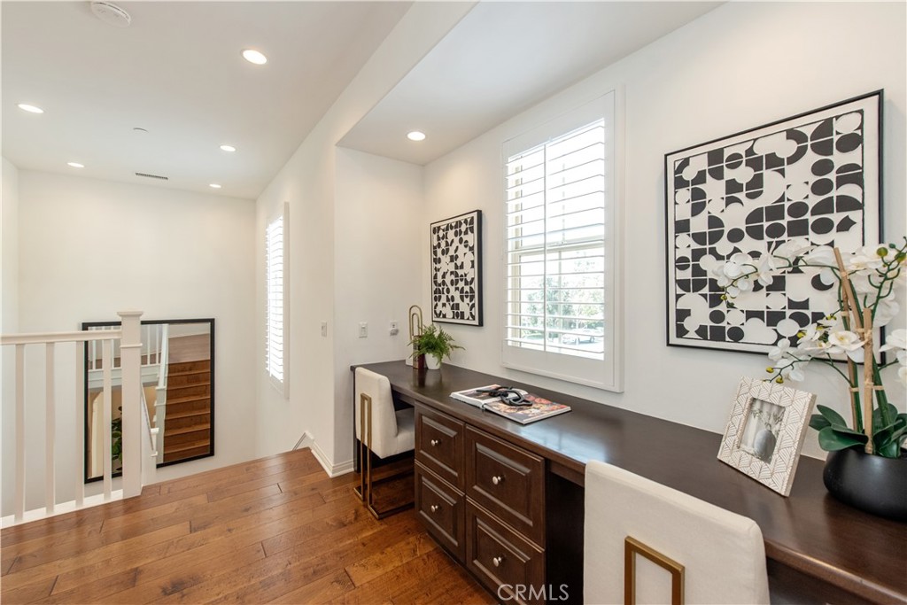238 Shelbourne Irvine, CA 92620 - Photo 25 of 36 a view of a workspace with furniture and a window
