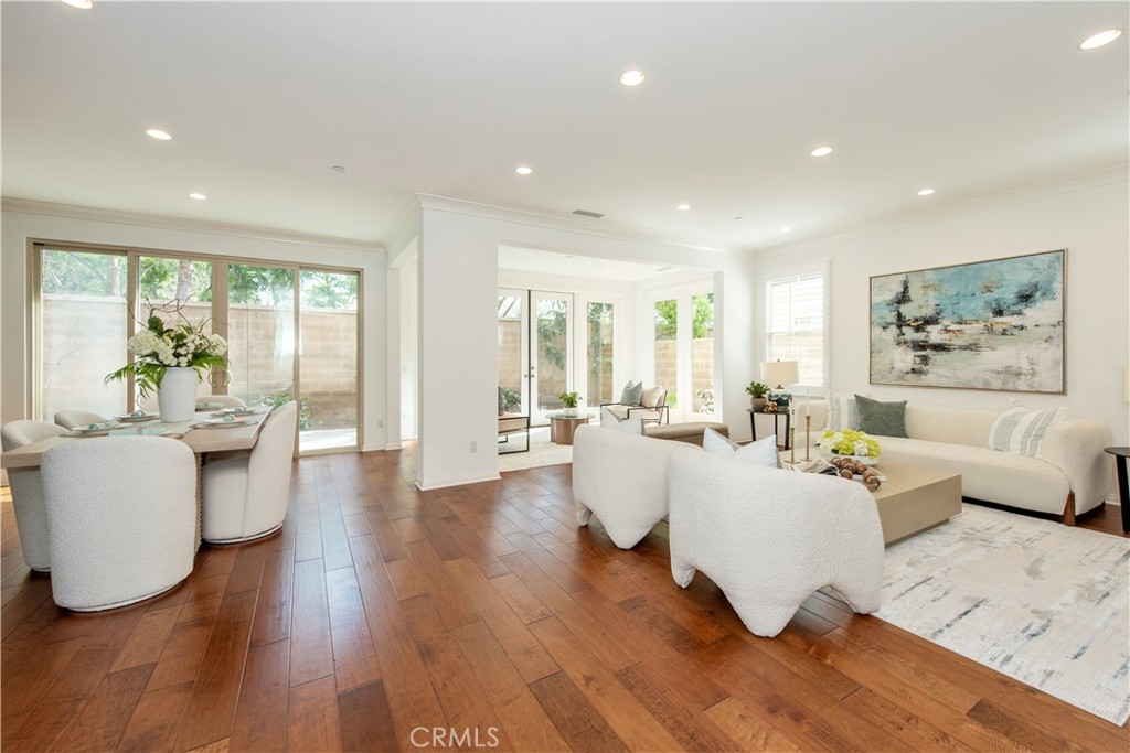 238 Shelbourne Irvine, CA 92620 - Photo 9 of 36 a living room with furniture and wooden floor