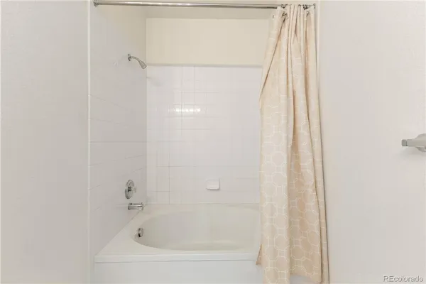 a close up of a bathtub in a bathroom