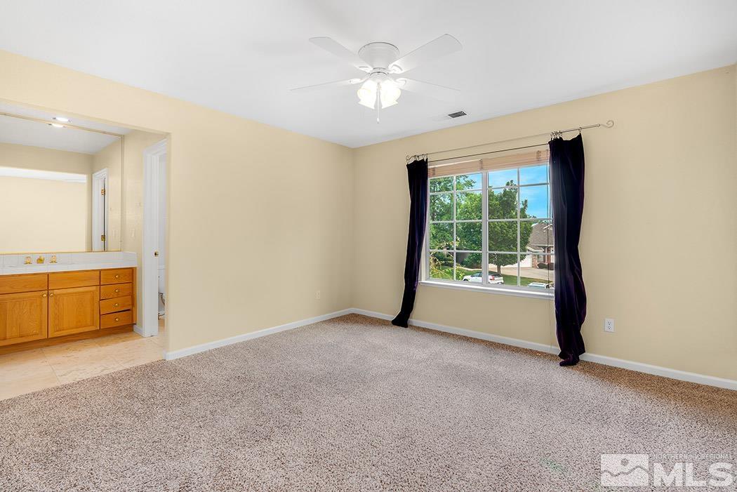 6142 Wycliffe Circle Reno, NV 89519 - Photo 20 of 29 a view of an empty room with a window
