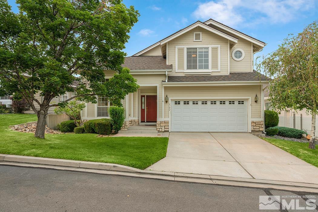 6142 Wycliffe Circle Reno, NV 89519 - Photo 2 of 29 a front view of a house with a yard and garage