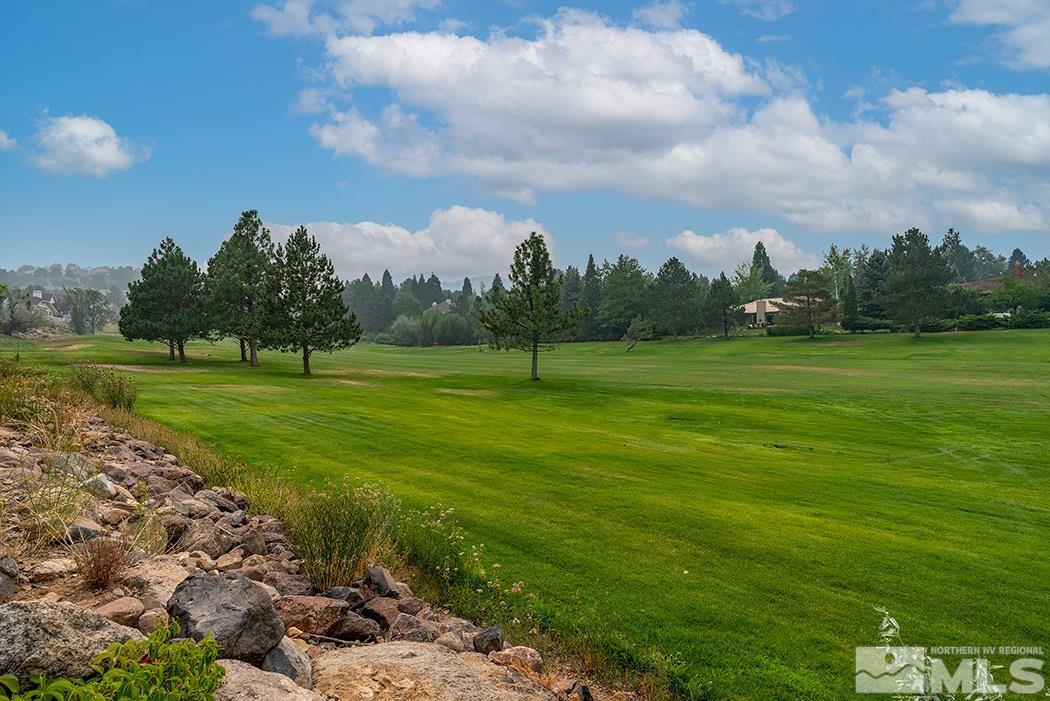 6142 Wycliffe Circle Reno, NV 89519 - Photo 27 of 29 a view of a golf course with a lake