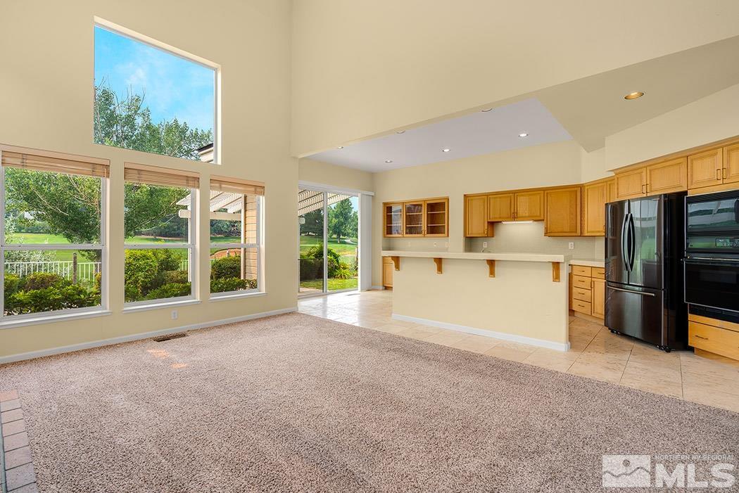 6142 Wycliffe Circle Reno, NV 89519 - Photo 6 of 29 a view of an empty room with a window