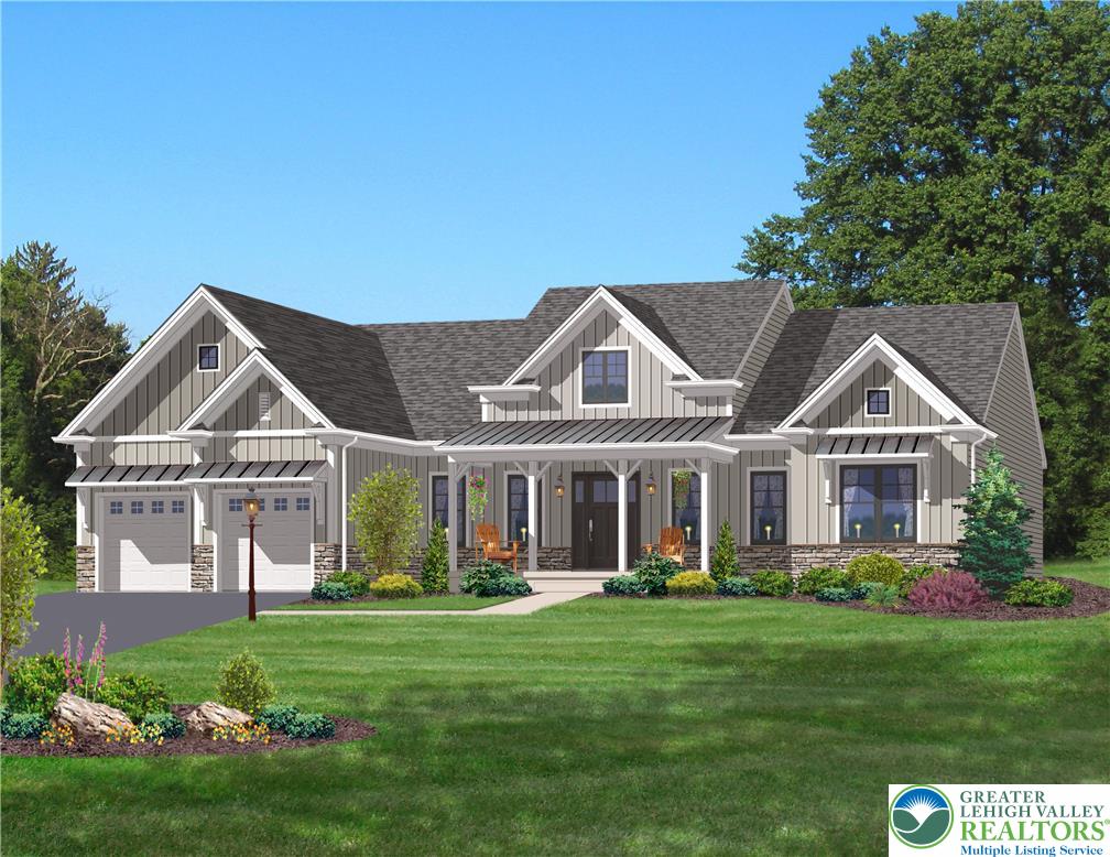 a front view of a house with a garden and trees