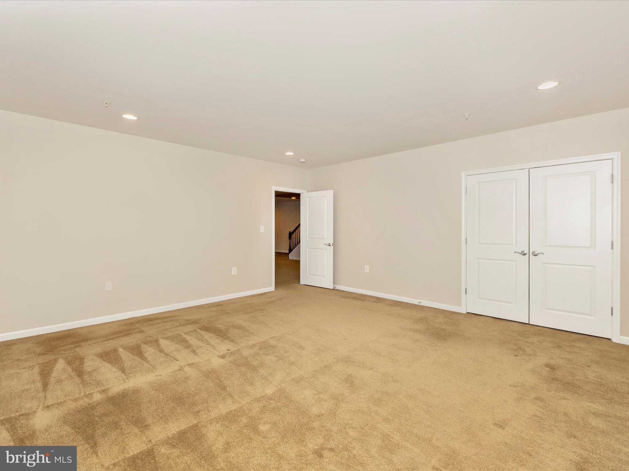 20209 Bupp Road Poolesville, MD 20837 - Photo 47 of 78 Lower Bedroom with double closets