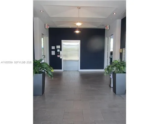 a picture of a bench in front of a window