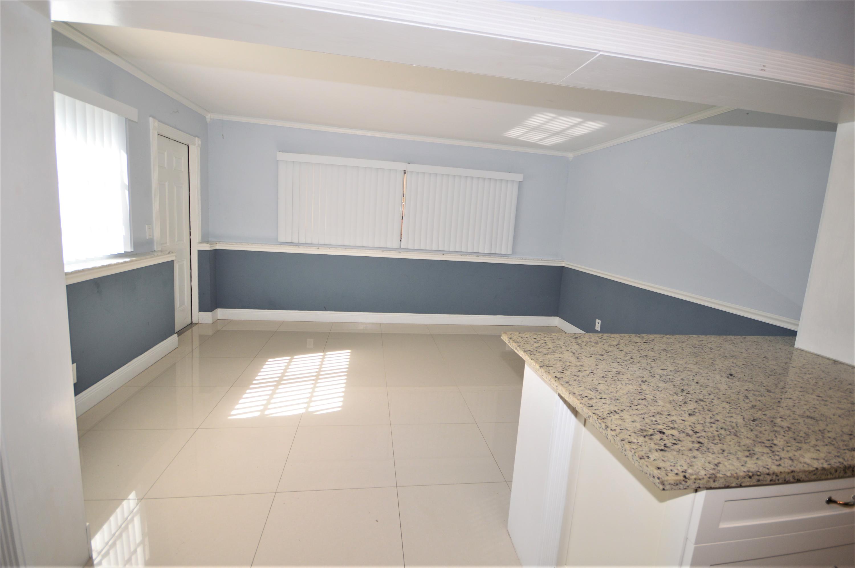 4092 Rochester Street Palm Beach Gardens, FL 33410 - Photo 17 of 28 a view of kitchen and window