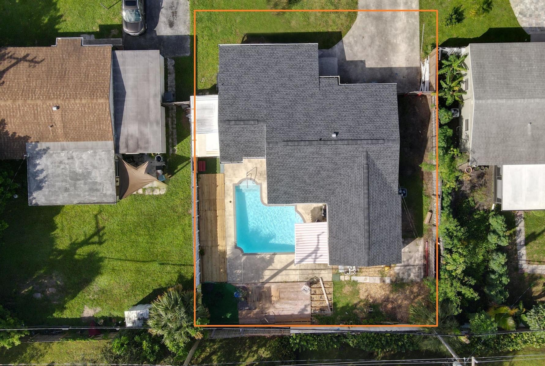 4092 Rochester Street Palm Beach Gardens, FL 33410 - Photo 3 of 28 an aerial view of a house with outdoor space